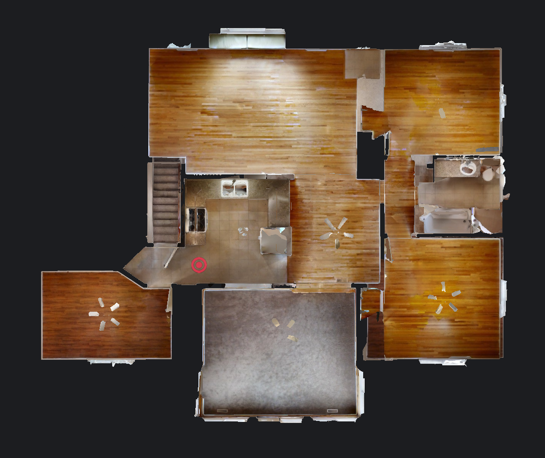 A top view of a real life floor plan of rooms with cherry wood floors, much like in the kind of homes that can receive Denver County property management from Walters and Company